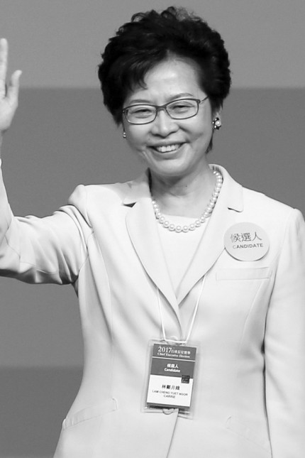 Carrie Lam waves after she won the election for Hong Kong's Chief Executive in Hong Kong; Carrie Lam