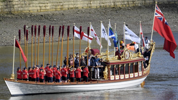 The royal rowbarge Gloriana during a pageant before the boat race