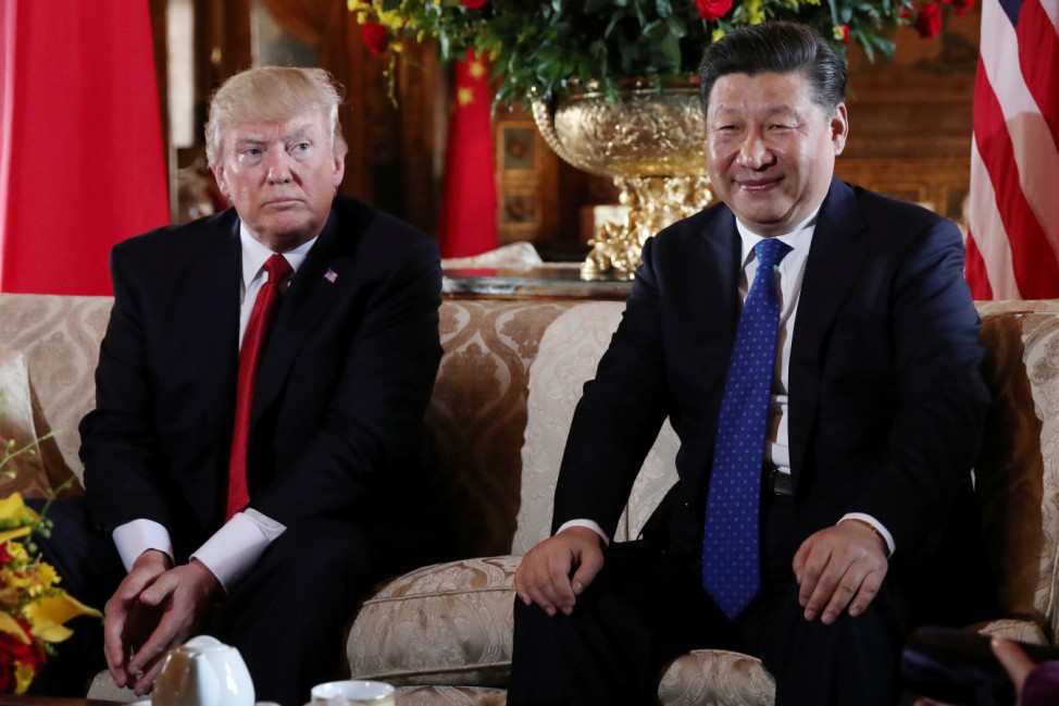 U.S. President Donald Trump welcomes Chinese President Xi Jinping at Mar-a-Lago state in Palm Beach, Florida, U.S.