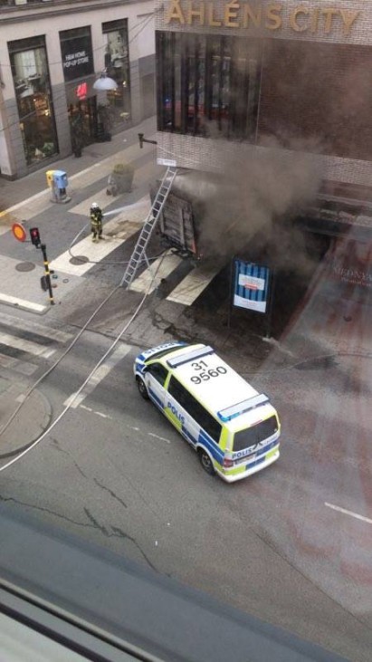 A view of the site where a truck drove into a crowd and into a department store in central Stockholm
