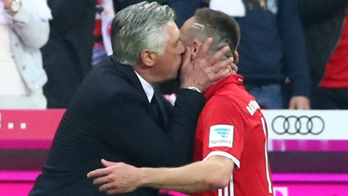Bayern Munich coach Carlo Ancelotti kisses Bayern Munich's Franck Ribery
