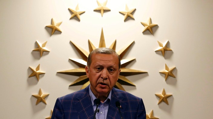 Turkish President Erdogan speaks during a news conference in Istanbul