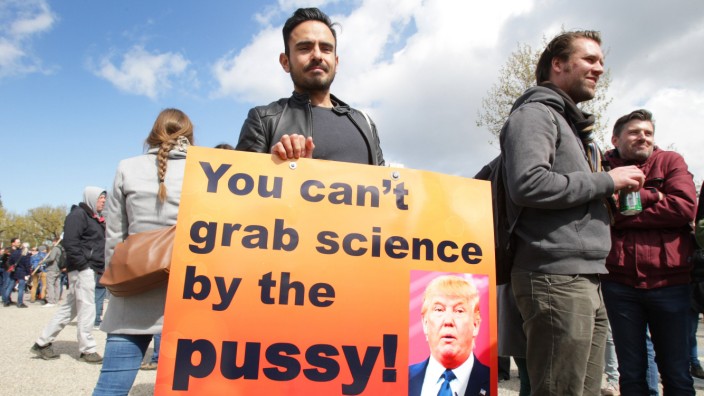 People march in support of scientific research during the March for Science demonstration in the Mus