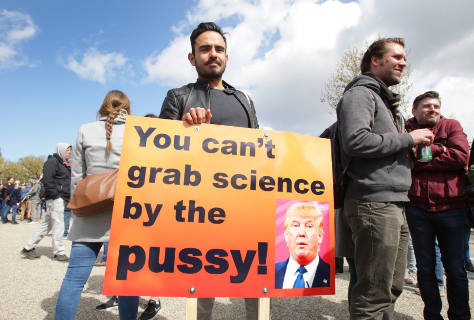 People march in support of scientific research during the March for Science demonstration in the Mus