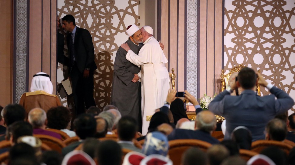 Pope Francis embraces Al-Azhar's Grand Imam Ahmed al-Tayeb during a meeting at Cairo