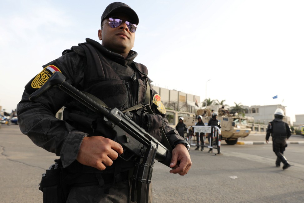 A security personnel stands guards during Pope Francis' visit, in Cairo