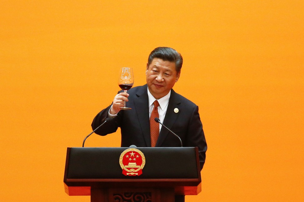 Chinese President Xi Jinping makes a toast at the beginning of the welcoming banquet at the Great Hall of the People during the first day of the Belt and Road Forum in Beijing