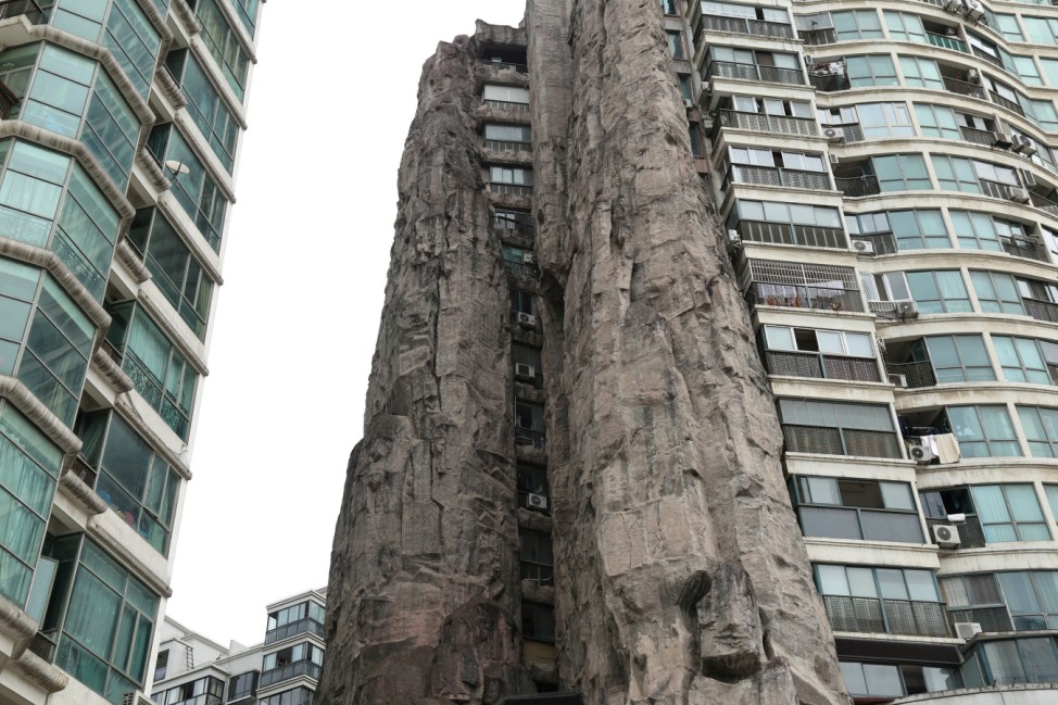 A residential building with a rock-like exterior facade is pictured in Shanghai