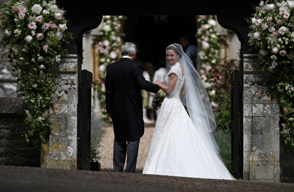 Pippa Middleton, the sister of Britain's Catherine, Duchess of Cambridge, arrives for her wedding to James Matthews at St Mark's Church in Englefield, west of London