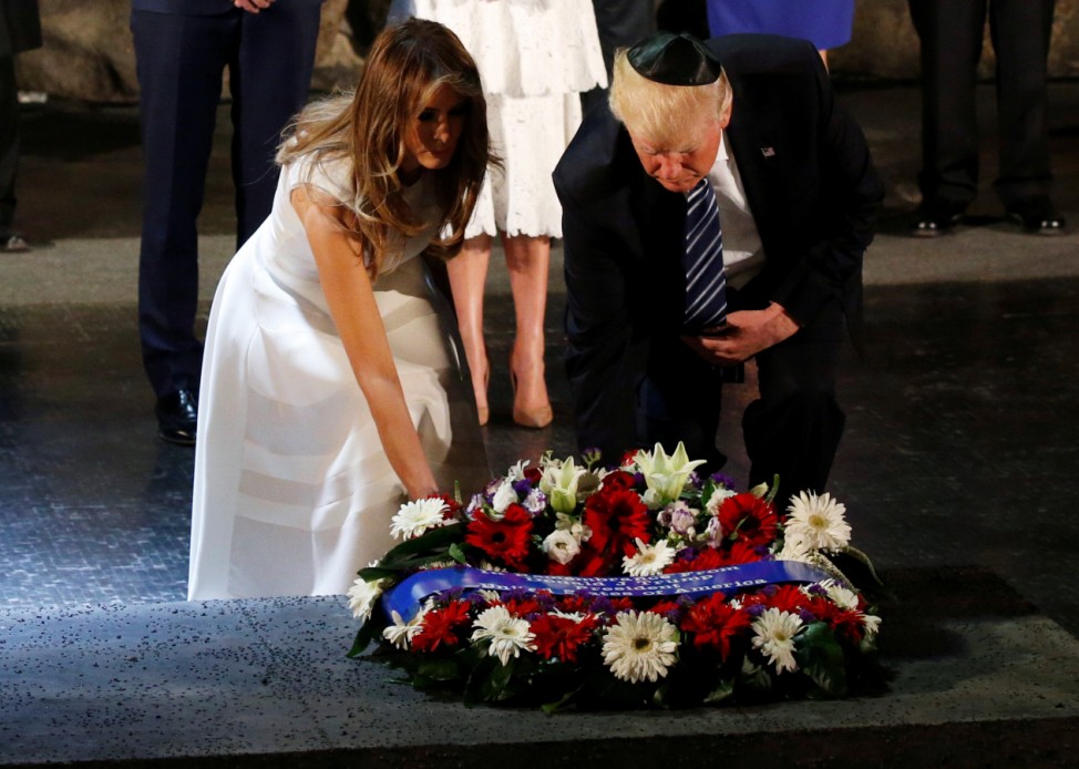U.S. President Donald Trump and first lady Melania lay a wreath during a ceremony commemorating the six million Jews killed by the Nazis in the Holocaust, in the Hall of Remembrance at Yad Vashem Holocaust memorial in Jerusalem