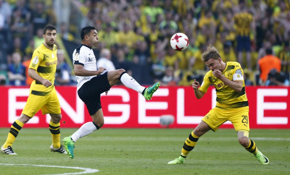 Eintracht Frankfurt's Marco Fabian in action with Borussia Dortmund's Marcel Schmelzer