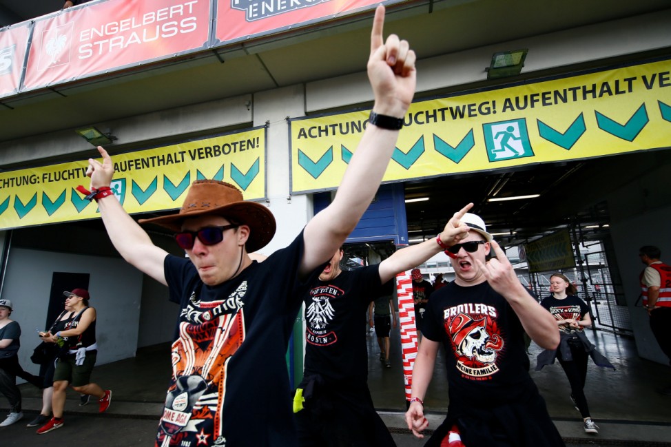 Festival goers arrive at the open-air weekend 'Rock am Ring' concert at Germany's Formula One race track Nuerburgring