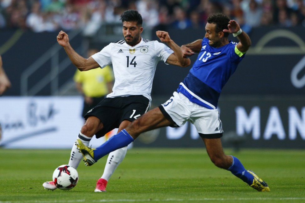 Germany's Emre Can in action with San Marino's Alessandro Della Valle