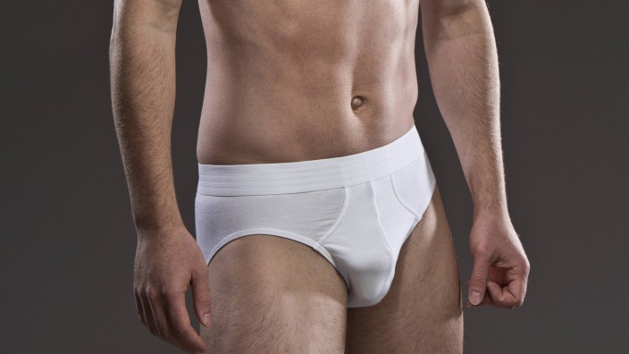 Portrait of muscular man wearing white underpants model released Symbolfoto PUBLICATIONxINxGERxSUIxA
