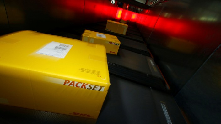 Parcels are pictured in a distribution centre of German postal and logistics group Deutsche Post DHL in Obertshausen