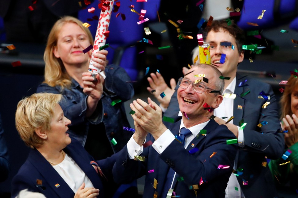Volker Beck of Germany's environmental party Die Gruenen (The Greens)  celebrates after a session of the lower house of parliament Bundestag voted on legalising same-sex marriage, in Berlin