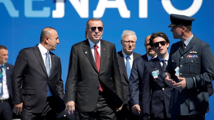 Turkish President Recep Tayyip Erdogan arrives to attend the NATO Summit at their new headquarters in Brussels