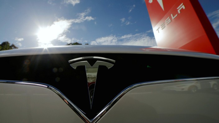 FILE PHOTO - A Tesla Model X car is pictured at a Tesla electric car dealership in Sydney