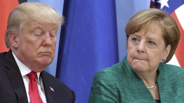 Merkel und Trump: Donald Trump und Angela Merkel besuchen eine Veranstaltung im Rahmen des G20-Gipfels am 8. Juli 2017 in Hamburg.