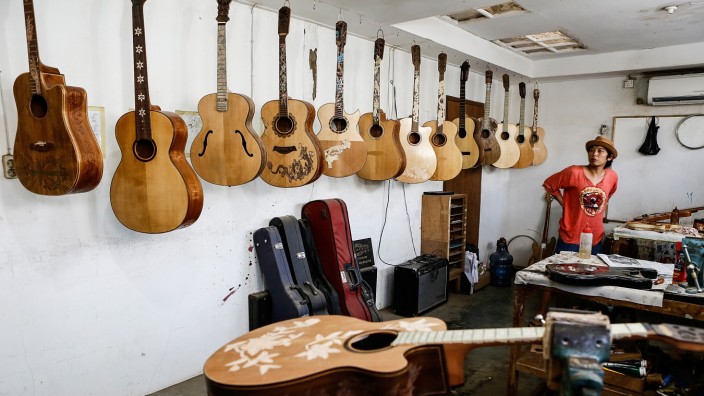 Master Balinese Woodworker Hand Carves High-End Guitars