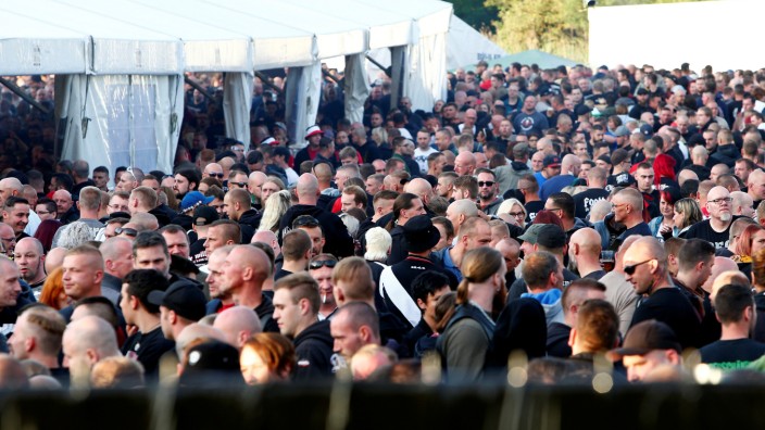 Participants take part at one of Germany's biggest right-wing music festivals in Themar