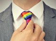 businessman with a rainbow necktie, with a slight vignette added