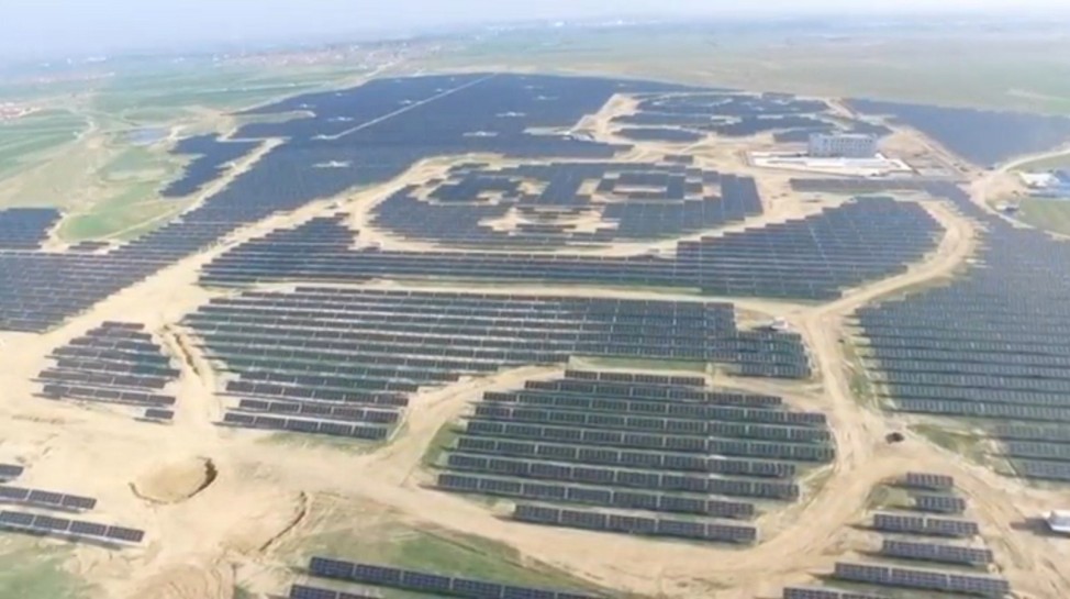 An aerial view shows panda-shaped solar plants built by Panda Green Energy Group in Shanxi province
