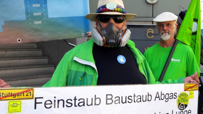 FILE PHOTO: Protesters demonstrate against pollution in front of a court in Stuttgart