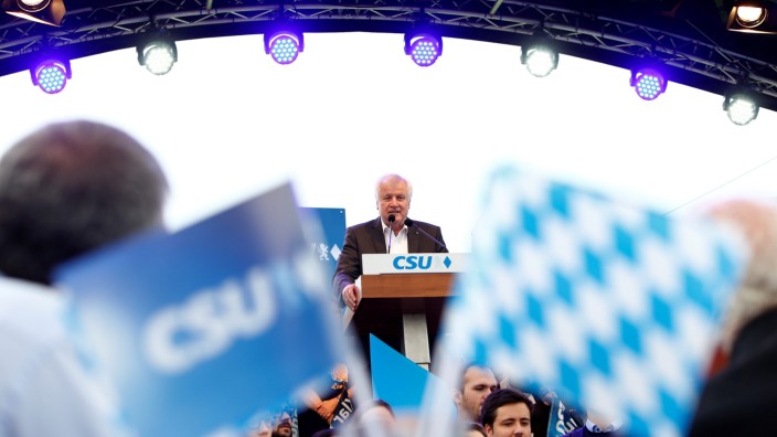 Bavarian state premier and head of the CSU Seehofer gives a speech during the start of a CSU election campaign rally in Munich