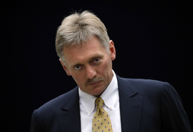 MOSCOW RUSSIA  JUNE 15 2017 Russia s Presidential Spokesman Dmitry Peskov looks on as Russia s P