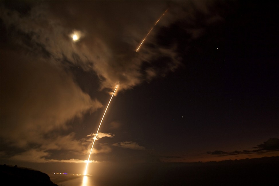 A medium-range ballistic missile target is launched from the Pacific Missile Range Facility, before being successfully intercepted by Standard Missile-6 missiles fired from the guided-missile destroyer USS John Paul Jones, in Kauai