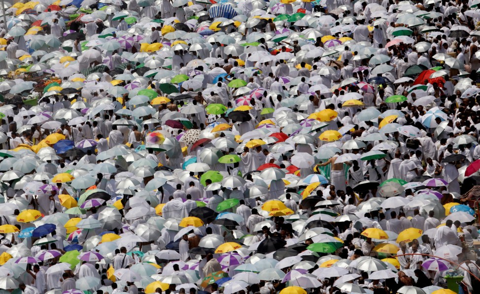 Muslim pilgrims pray outside Namira Mosque on the plains of Arafat during the annual haj pilgrimage, outside the holy city of Mecca
