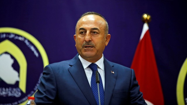 Turkish foreign minister Mevlut Cavusoglu speaks during a joint news conference with Iraqi Foreign Minister Ibrahim al-Jaafari in Baghdad
