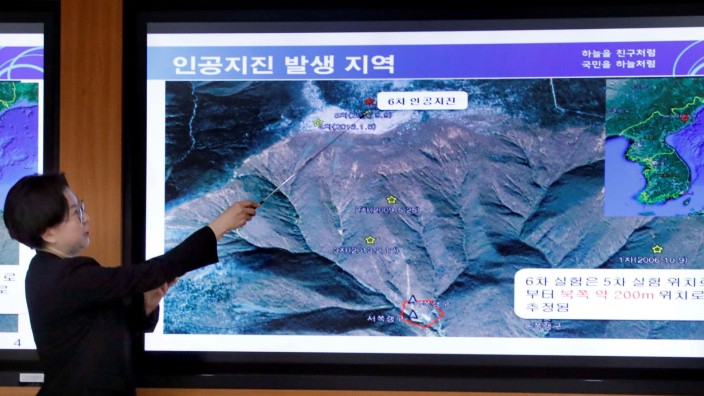 South Korea's Earthquake and Volcano Monitoring Division officer points at where seismic waves observed during a media briefing at Korea Meteorological Administration in Seoul