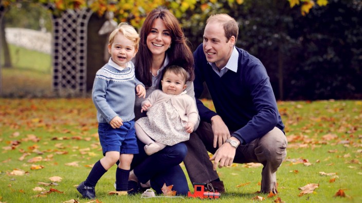 Handout photo of Britain's Prince William and his family; Handout photo of Britain's Prince William and his family