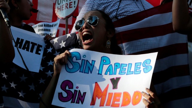 Paulina Ruiz of Los Angeles chants with supporters of the Deferred Action for Childhood Arrivals (DACA) program on Olivera Street in Los Angeles, California,
