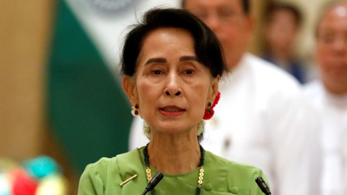 Myanmar State Counselor Aung San Suu Kyi talks during a news conference with India's Prime Minister Narendra Modi in Naypyitaw