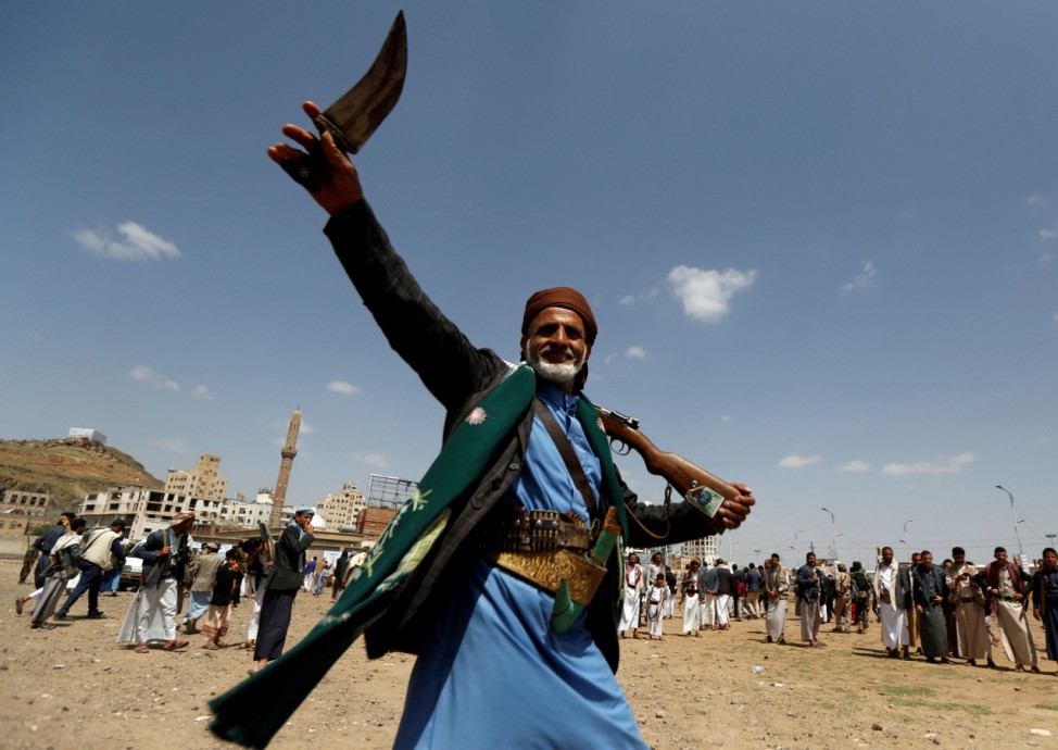 Follower of the Shi'ite Houthi movement performs the traditional Baraa dance during a ceremony marking Eid al-Ghadir in Sanaa, Yemen
