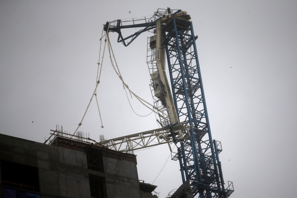 A collapsed construction crane is seen in Downtown Miami as Hurricane Irma arrives at south Florida