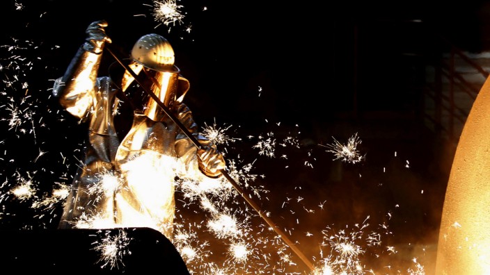 FILE PHOTO: File photo of worker of German steelmaker ThyssenKrupp controling a blast furnace in Duisburg