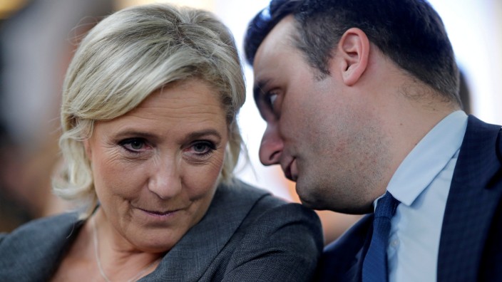 FILE PHOTO - France's far-right National Front (FN) leader Marine Le Pen and vice-president Florian Philippot attend a FN political debate in Paris