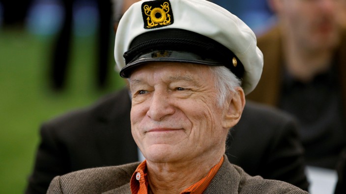 FILE PHOTO -  Playboy Magazine founder Hefner smiles at the news conference for the upcoming Playboy Jazz Festival, at the Playboy Mansion in Los Angeles