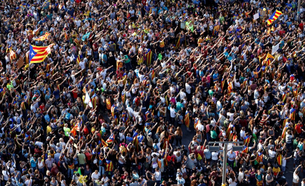 People gather near the old university of Barcelona, two days after the banned independence referendum in Barcelona