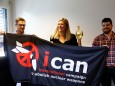 Fihn, Executive Director of ICAN, her husband Will Fihm Ramsay and Daniel Hogsta, coordinator, celebrate after ICAN won the Nobel Peace Prize 2017, in Geneva