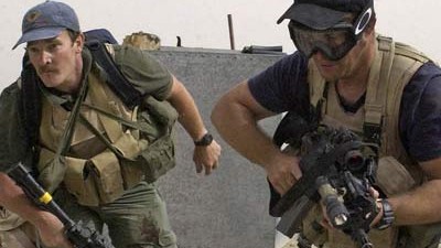 Private Militärfirmen: Blackwater-Söldner im Zivil bei einem Einsatz im Irak.