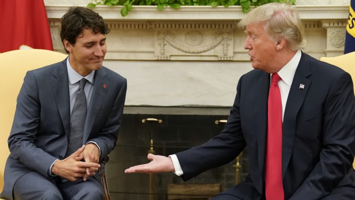 U.S. President Trump greets Canadian Prime Minister Trudeau at the White House in Washington