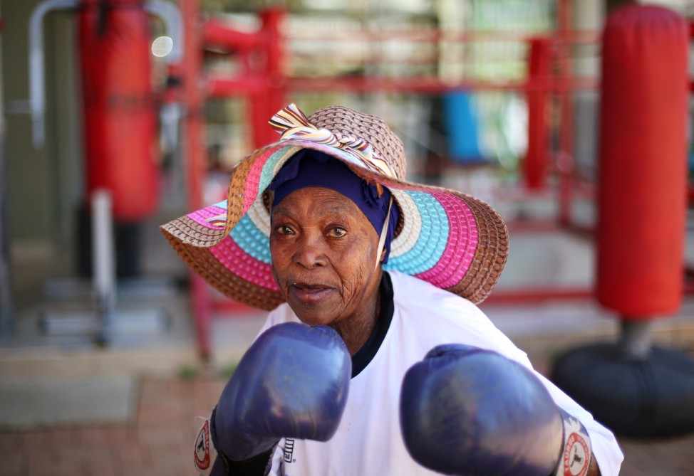 Zodwa Thwala, 70 years old, poses for a photograph before taking part in boxing lessons in an attempt to battle old age with exercise at Cosmo city outside Johannesburg