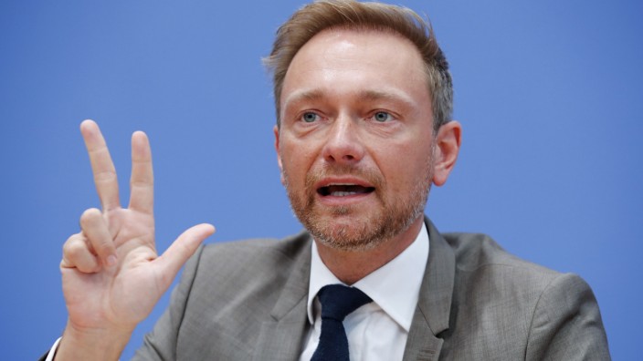 FILE PHOTO: Free Democratic Party FDP leader Christian Lindner gestures during a news conference in Berlin