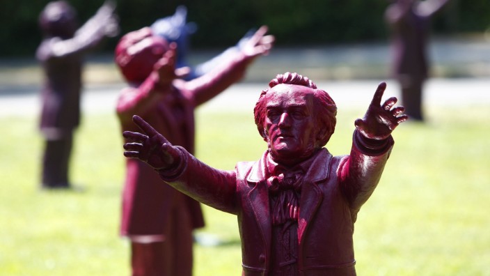 Sculptures of German composer Richard Wagner are seen outside the Green Hill opera house in Bayreuth