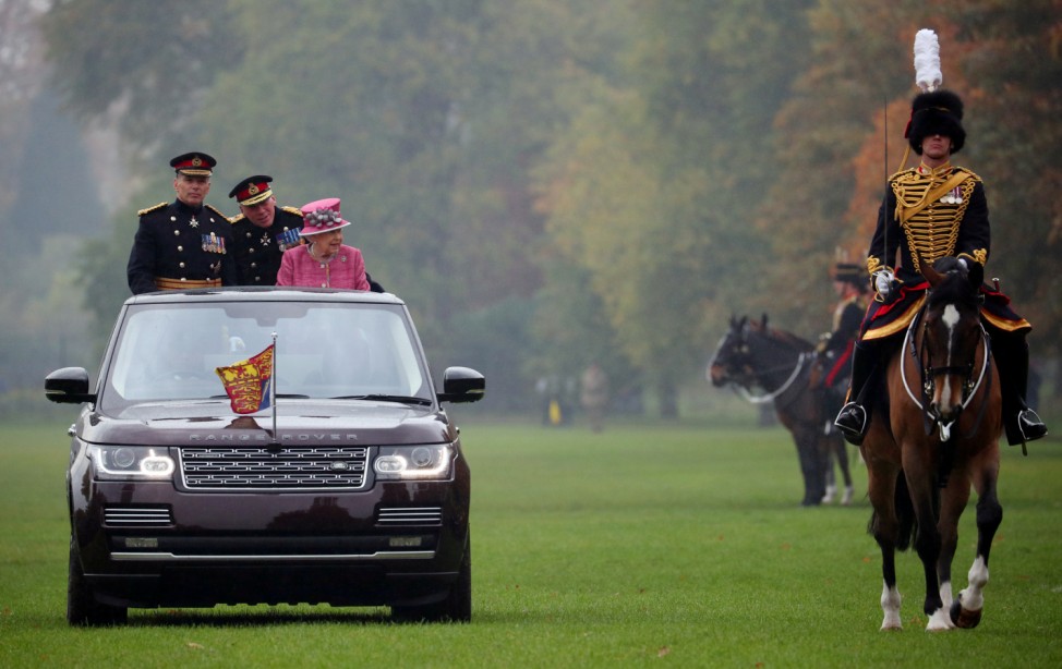Britain's Queen Elizabeth II inspects The King's Troop Royal Horse Artillery in Hyde Park in London